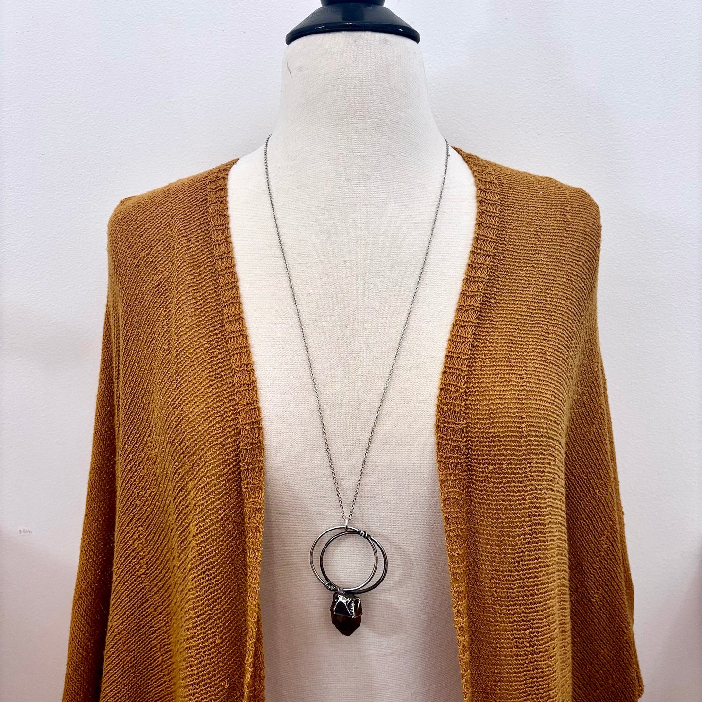 Raw smoky quartz crystal necklace in fine silver from FOXLARK collection, featuring a unique, natural gemstone pendant.