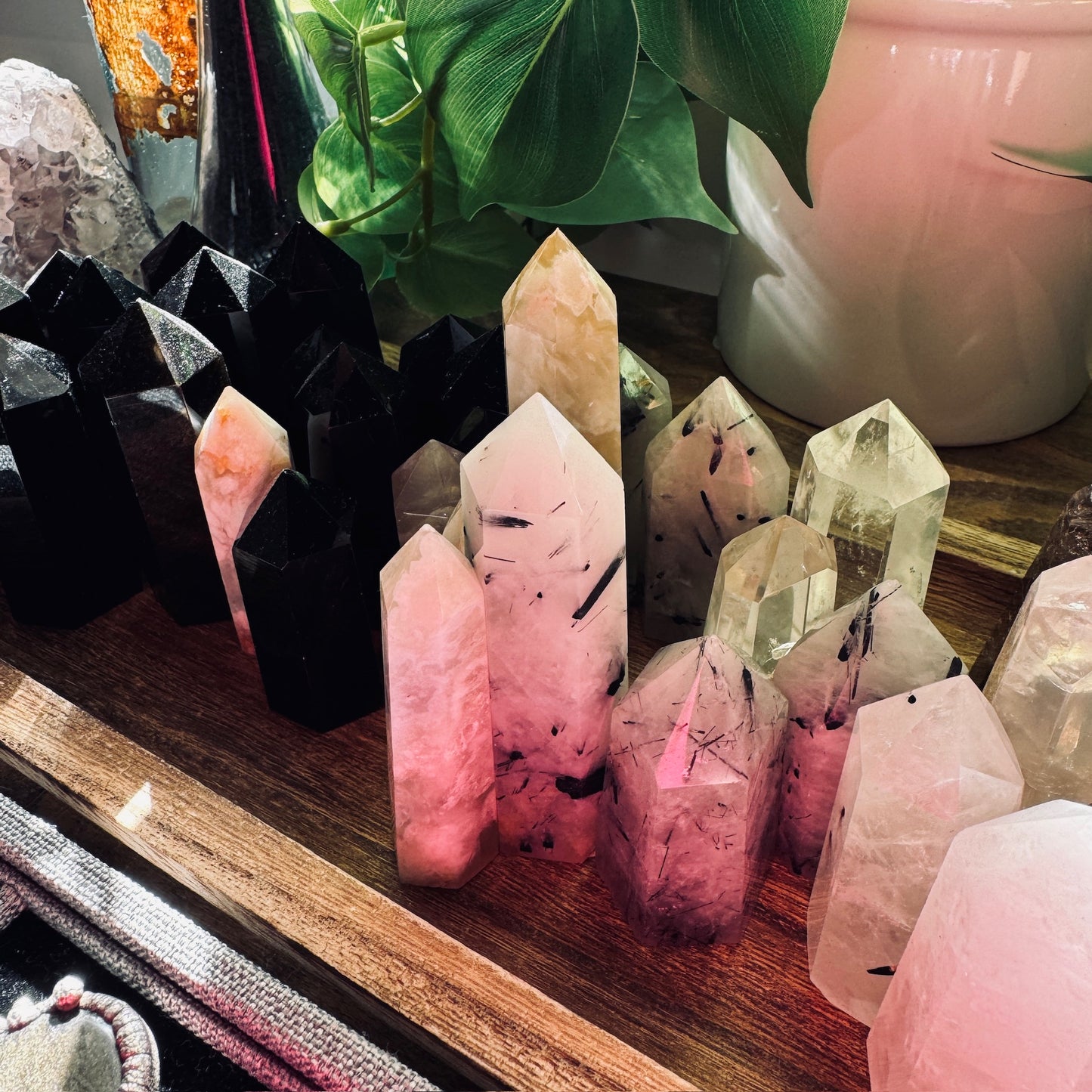 Wrapin Sage and crystal bundle with a white sage smudge stick and a clear quartz crystal point, ideal for cleansing and meditation.