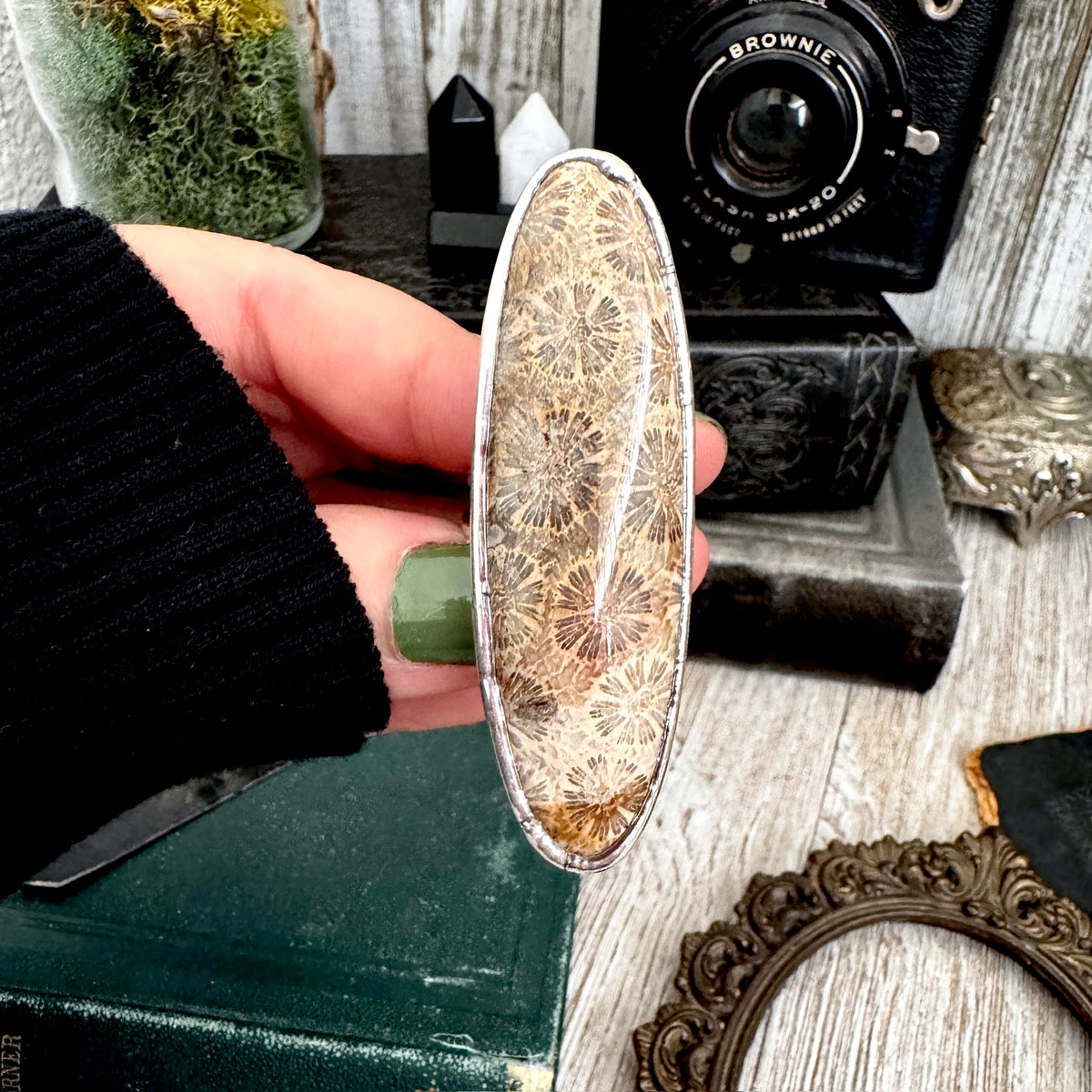 Fossilized coral crystal ring by FOXLARK, fine silver, size 10, featuring a unique fossilized coral stone in a detailed setting.