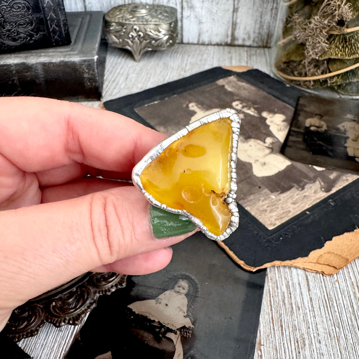 Raw Baltic Amber crystal ring by FOXLARK with fine silver band, size 8, showcasing a unique, one-of-a-kind design.