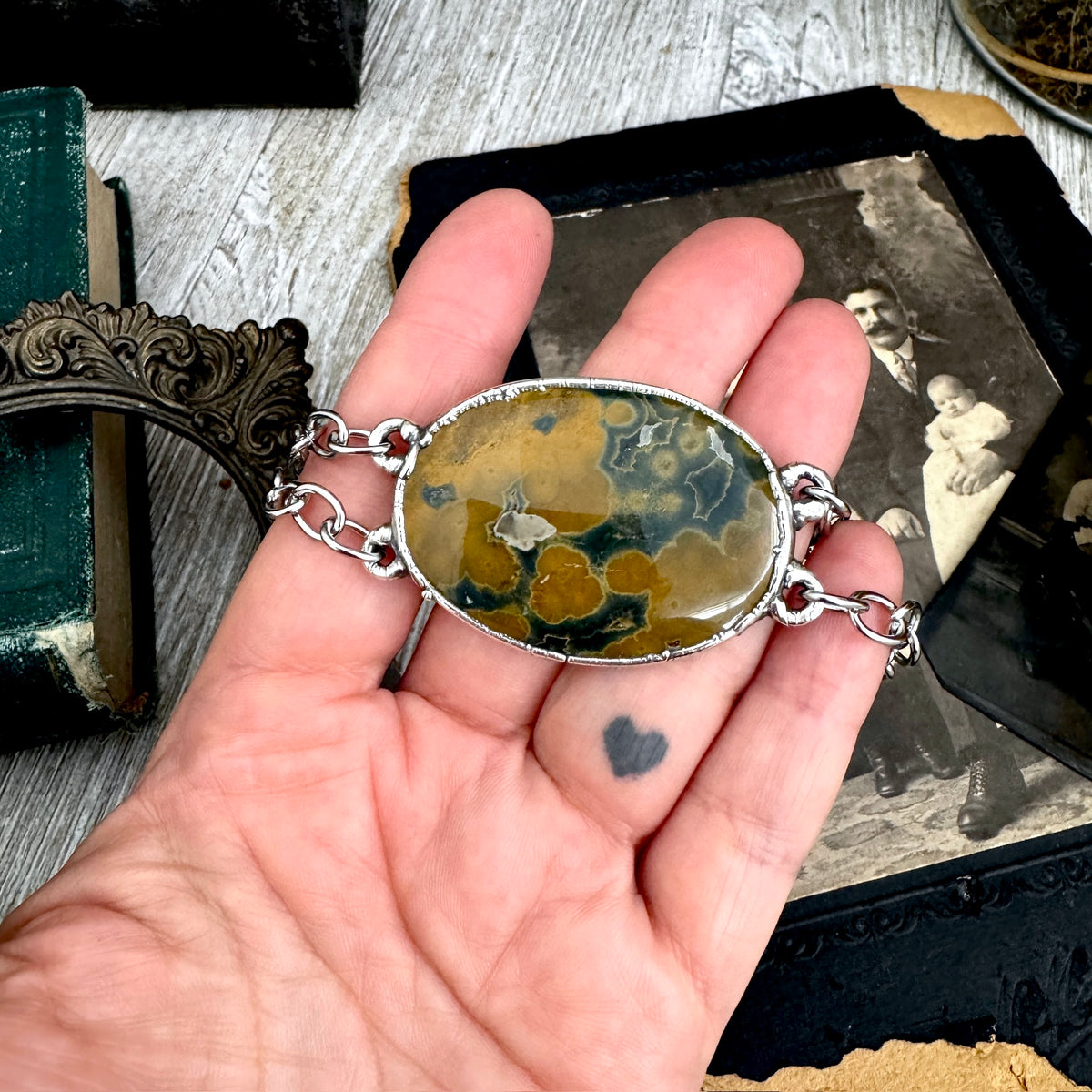 One-of-a-kind Ocean Jasper crystal bracelet with fine silver accents from Foxlark Crystal Jewelry, showcasing vibrant, polished gemstone beads.