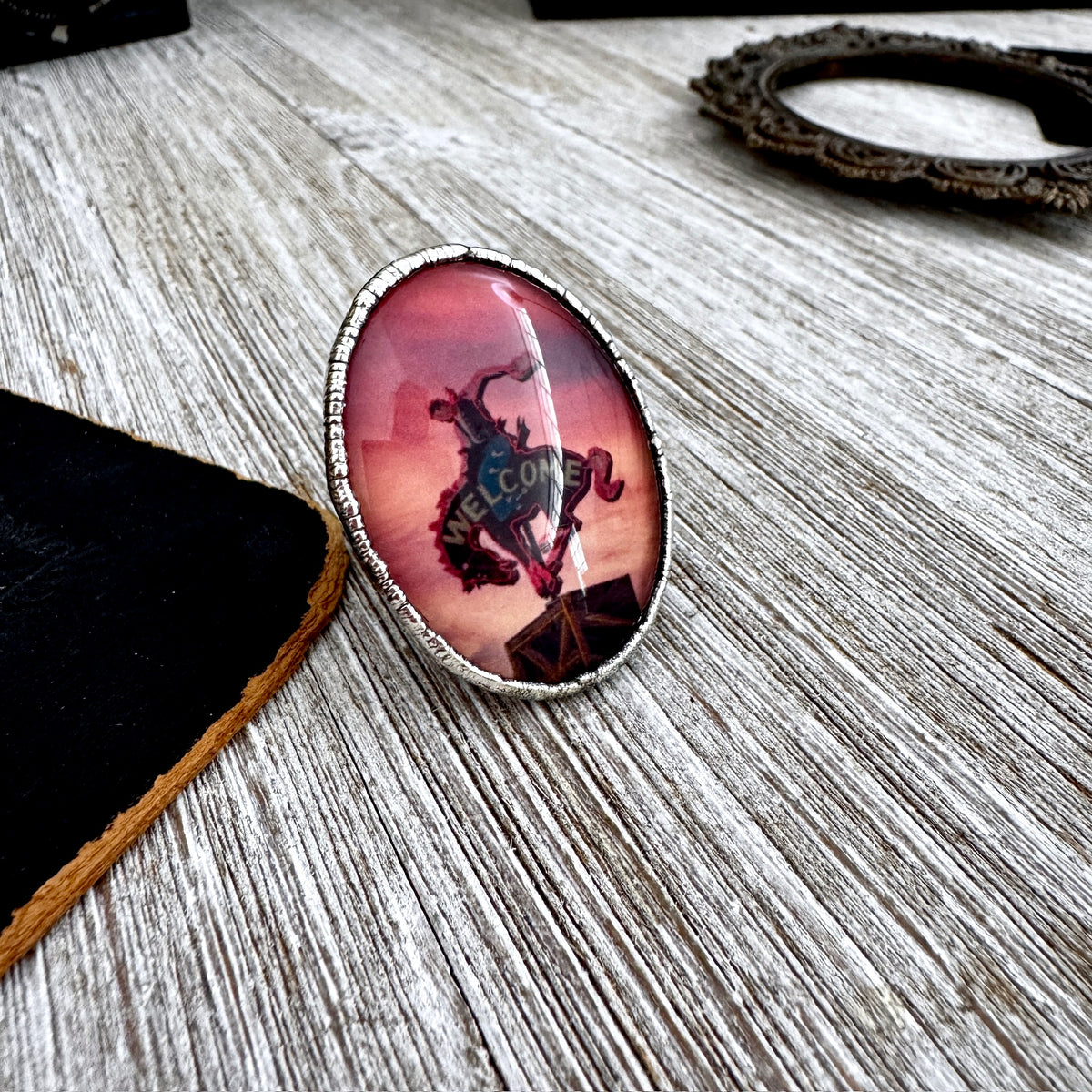 Silver cowboy road sign sunset ring by FOXLARK, size 9, featuring a detailed design on a fine silver band.