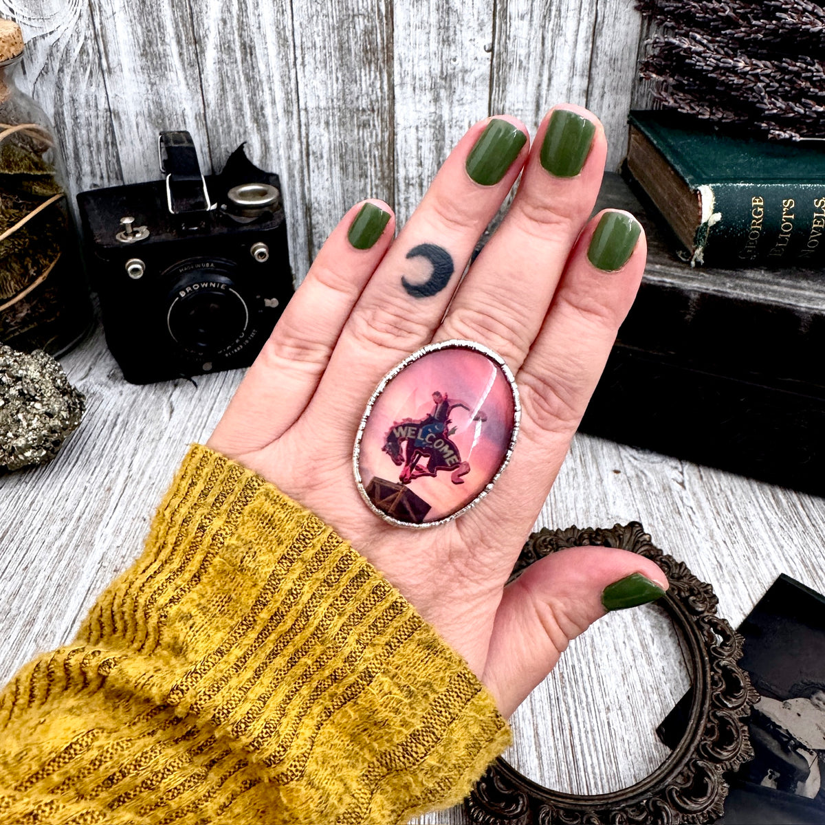 Fine silver cowboy road sign sunset ring by FOXLARK, size 9, featuring detailed road and sunset design, one-of-a-kind jewelry piece.