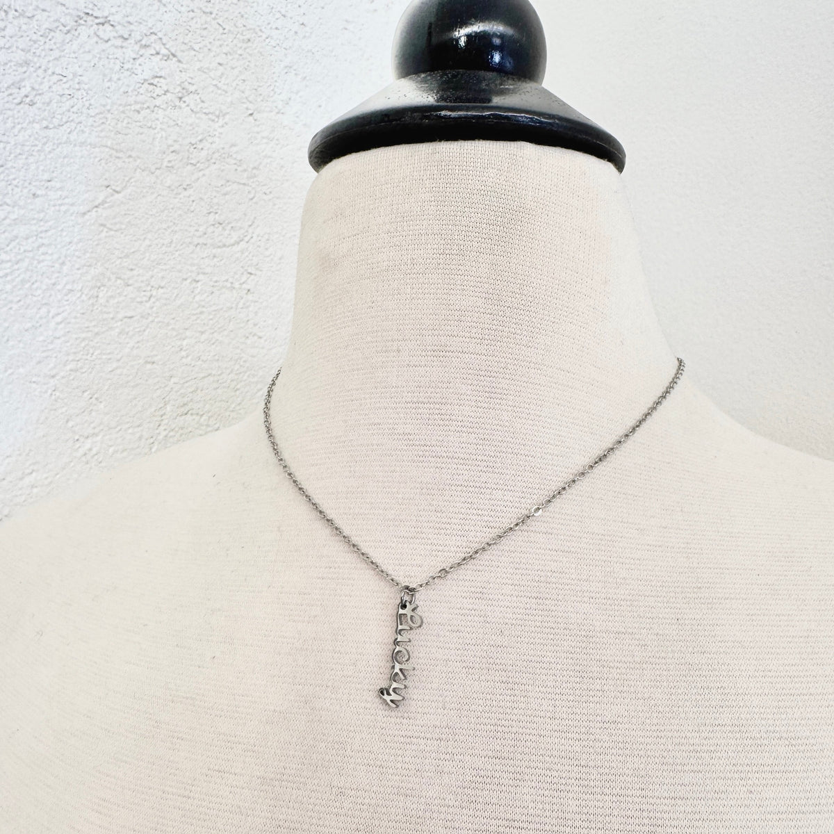 FOXLARK Lucky Charm pendant necklace featuring a delicate charm with the "Pocket the Good Stuff" design for charm jewelry.
