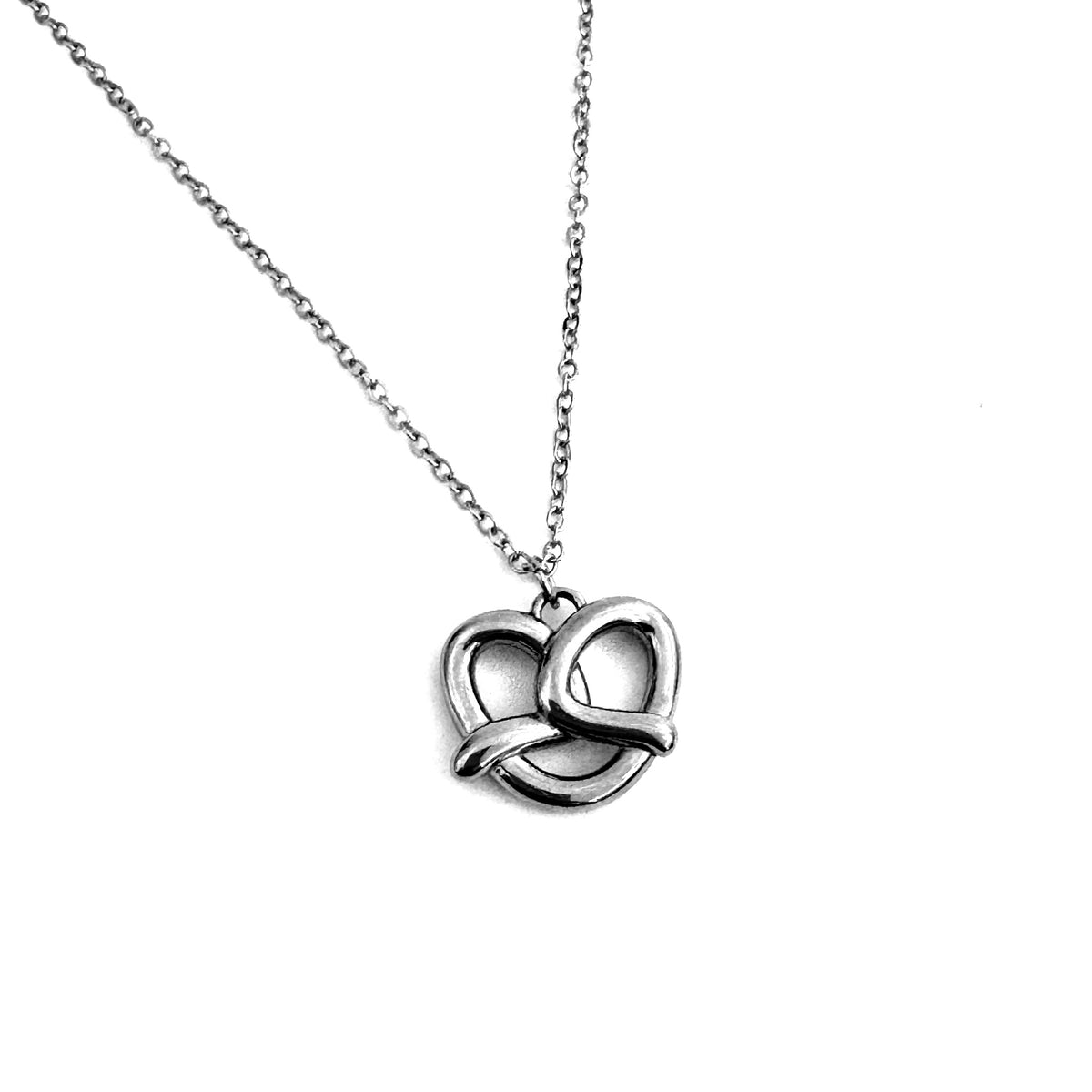 FOXLARK Pretzel Charm necklace featuring a quirky "Carbs Are a Personality" pendant, perfect for fun, casual jewelry.