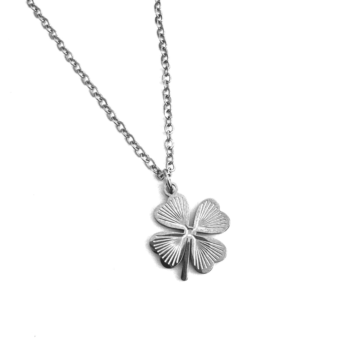 FOXLARK Four Leaf Clover charm pendant necklace, a lucky charm jewelry piece with a detailed four-leaf clover design.