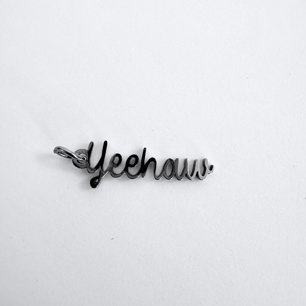 FOXLARK Yeehaw Rodeo Charm pendant necklace featuring a Western-themed charm with cowboy-inspired details.