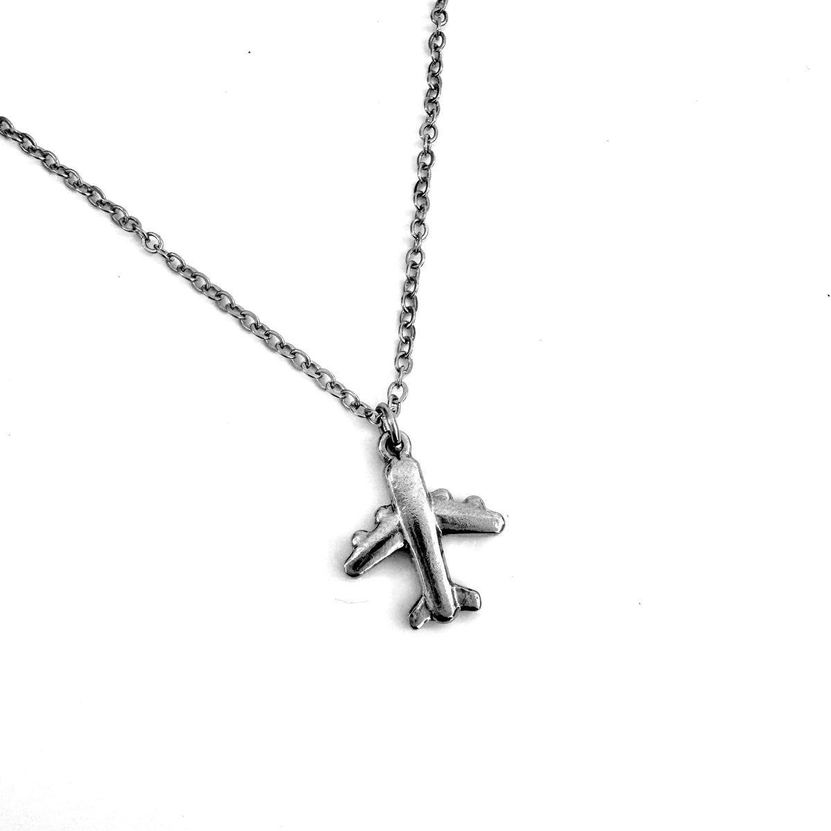 FOXLARK airplane charm pendant, passport-ready dainty necklace charm from the Lucky Charm Bar, featuring a sleek airplane design.