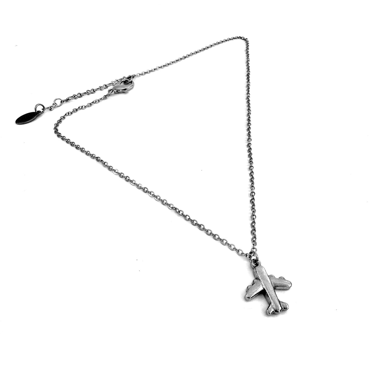FoXLARK airplane charm pendant, dainty necklace charm from the Lucky Charm Bar, passport-ready airplane jewelry accessory.