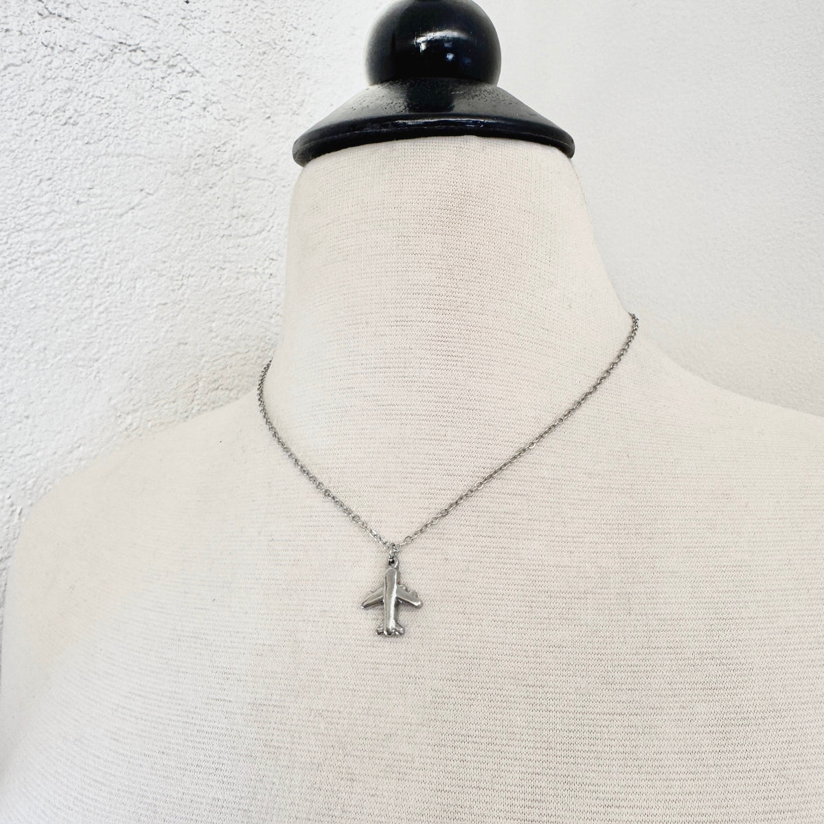 Dainty airplane charm necklace pendant from FOXLARK's Lucky Charm Bar, perfect for passport-ready travel accessories.