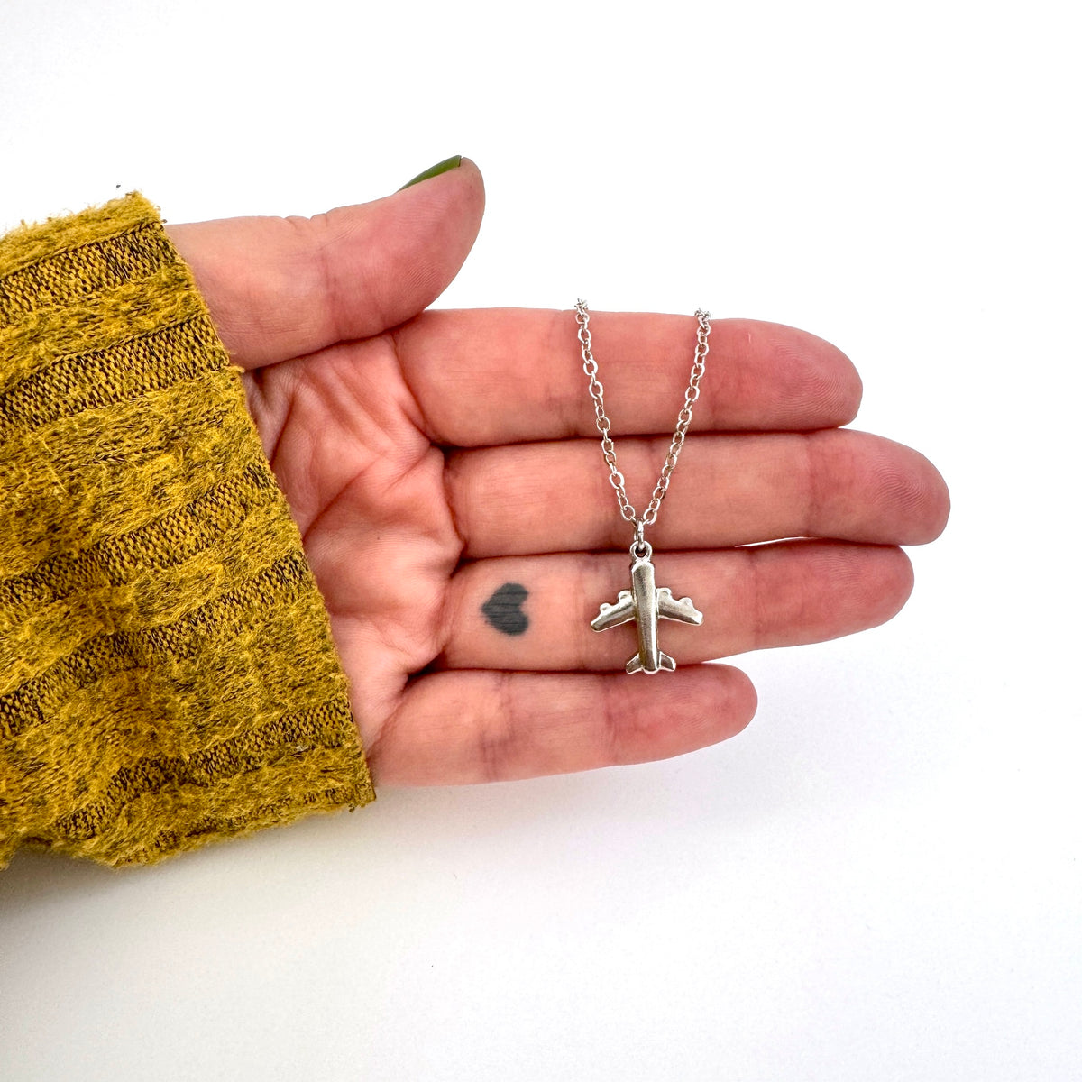FoXLARK airplane charm pendant, dainty necklace charm from the Lucky Charm Bar, passport ready airplane jewelry accessory.