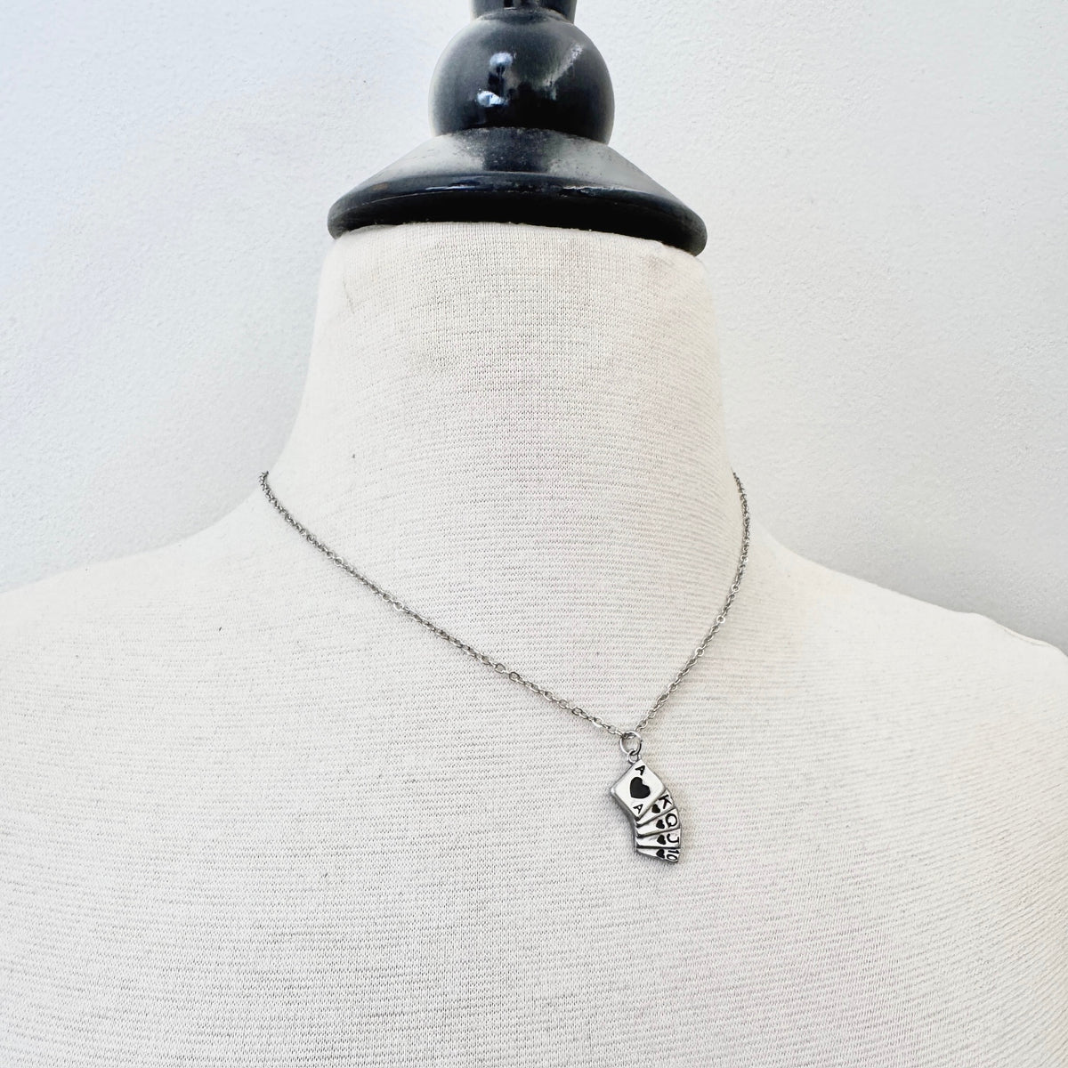 FOXLARK Playing Cards Charm from Dealer's Choice collection, featuring a quirky necklace or pendant with card design.