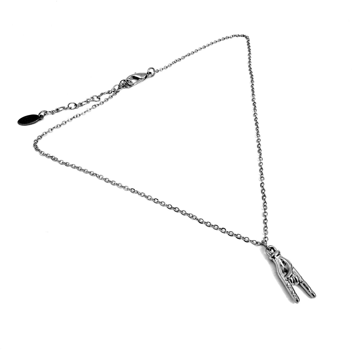FOXLARK Rock On Hand charm pendant necklace featuring a dainty, bold hand design for the girl who’s always loud.
