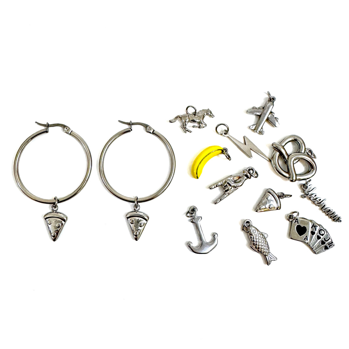 FOXLARK Everyday Charm Collector Hoop Earrings featuring round tube stainless steel hoops with lucky charm charms.