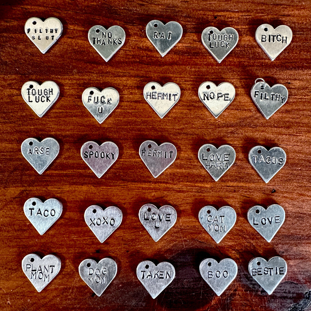 FOXLARK hand stamped heart necklace featuring a personalized engraved heart pendant on a delicate chain.