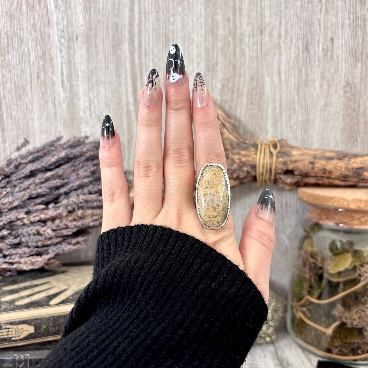 Fossilized coral crystal ring by FOXLARK, fine silver band, size 7.5, featuring unique fossilized coral gemstone design.