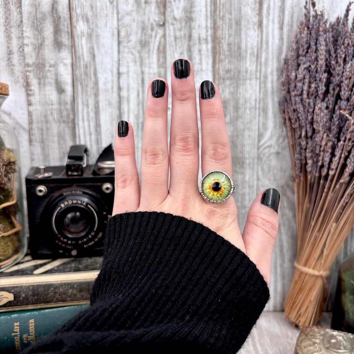 Green eyeball fine silver ring by FOXLARK featuring a detailed eyeball design, available in sizes 5 to 10.