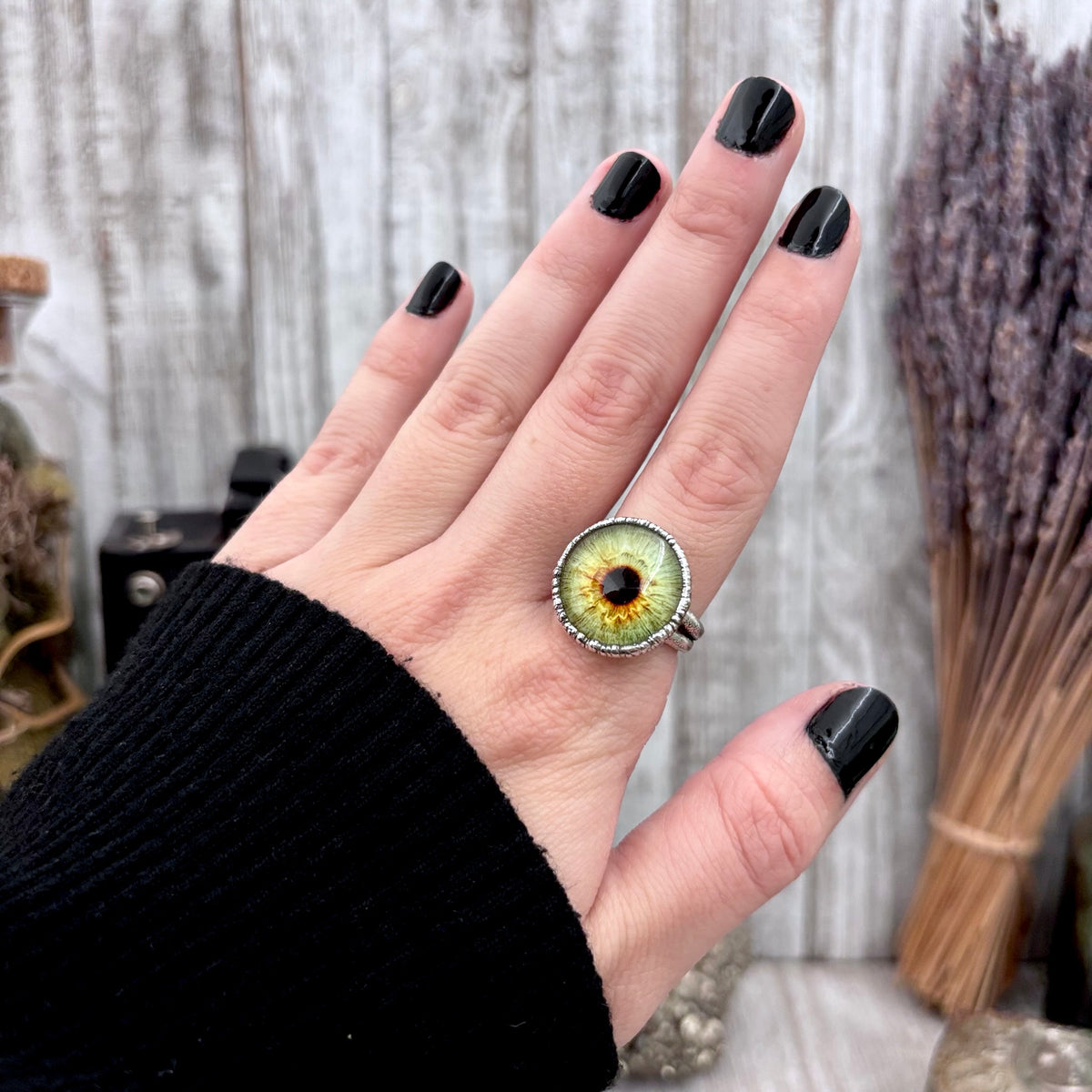 Green eyeball silver ring from FOXLARK collection, available in sizes 5-10, showcasing detailed design and fine silver craftsmanship.