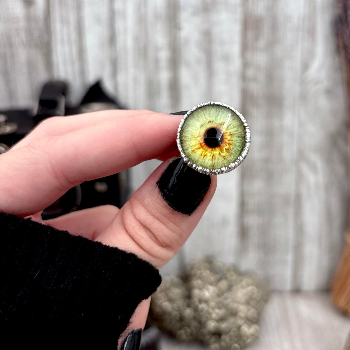 Green eyeball silver ring from FOXLARK collection, available in sizes 5 to 10, featuring a detailed eyeball design.