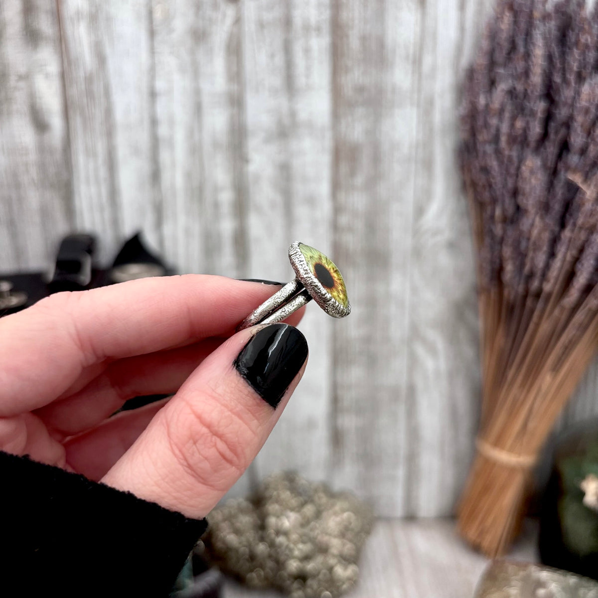 Green eyeball silver ring from FOXLARK collection, available in sizes 5-10, featuring a detailed eyeball design on fine silver band.