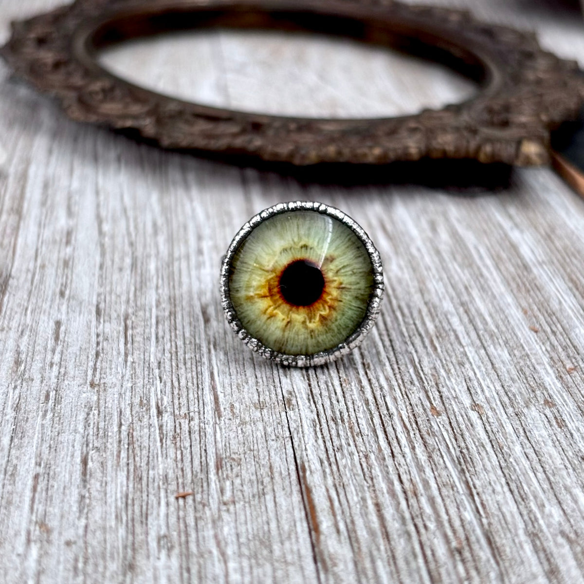 Green eyeball silver ring by FOXLARK, available in sizes 5 to 10, featuring detailed eye design from the FOXLARK collection.