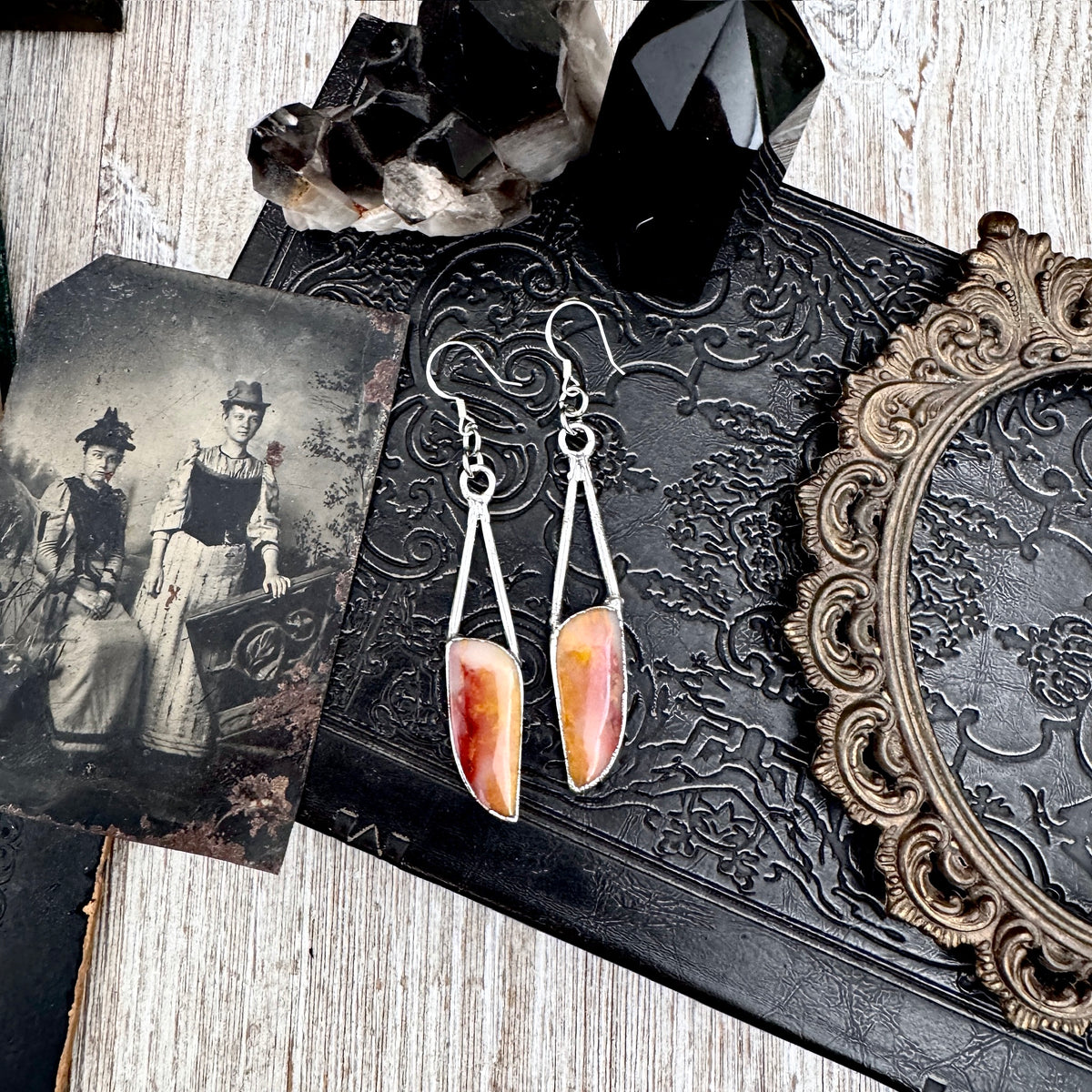 Jasper silver crystal dangle earrings by FOXLARK featuring long witchy design with sparkling crystals and silver accents.