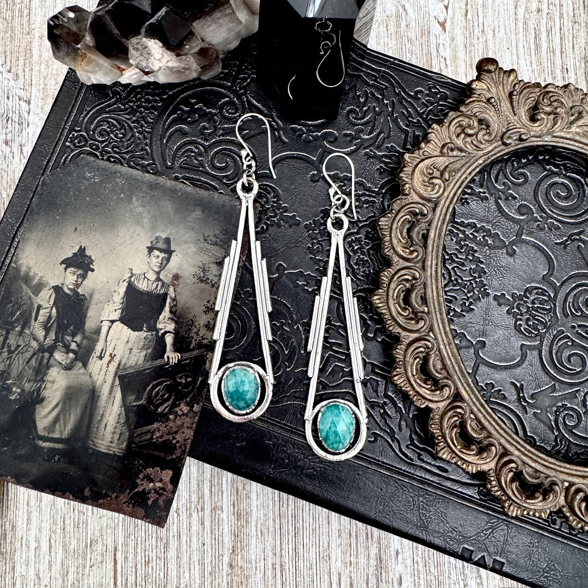 Amazonite silver crystal dangle earrings by FOXLARK, featuring long, witchy-style earrings with shimmering crystals and intricate silver details.
