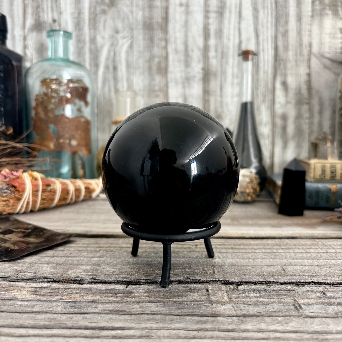 Large black obsidian crystal ball from FoxlarkCrystals, polished stone with smooth, glossy surface ideal for meditation or decor