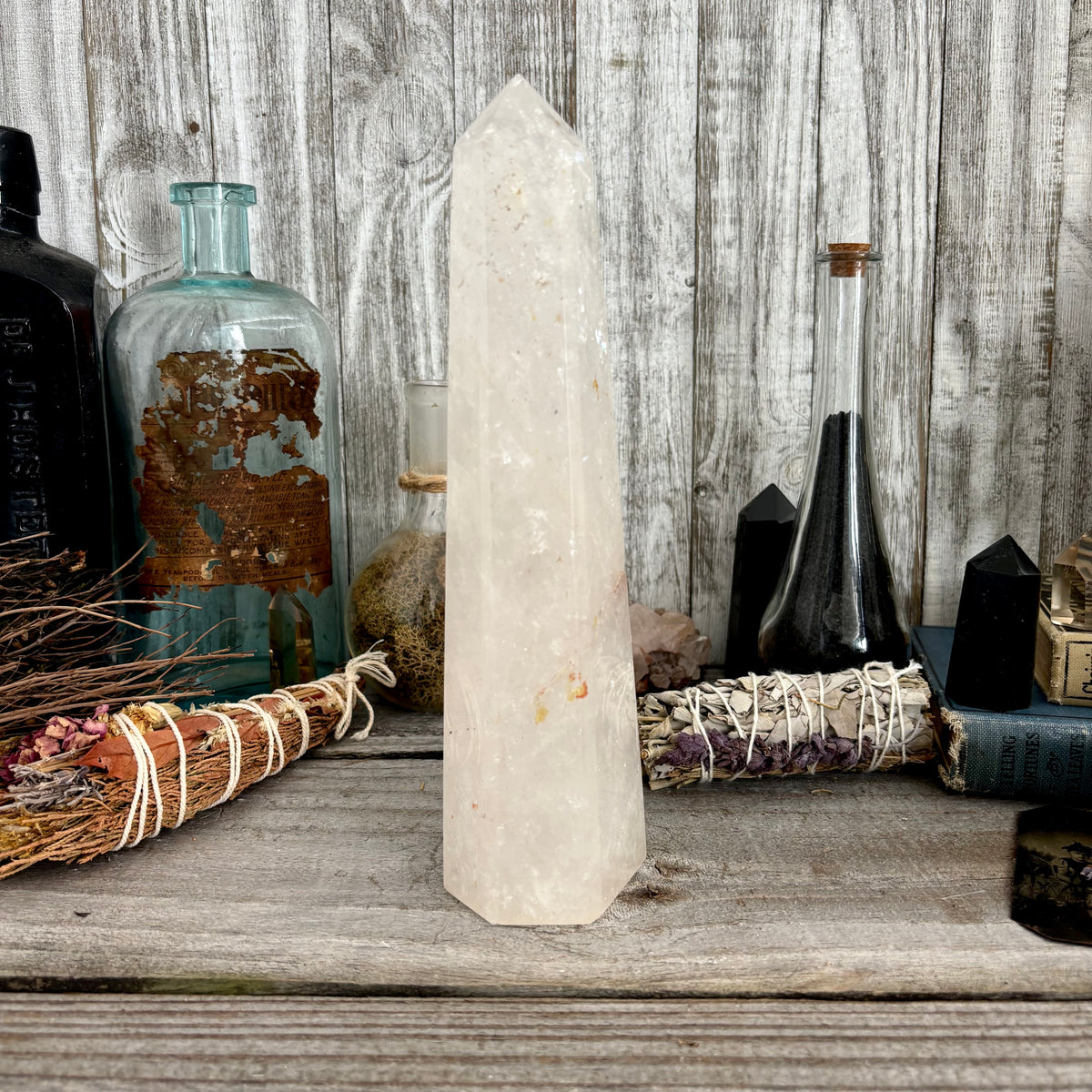 Large clear quartz crystal point standing upright, natural self-standing crystal from FoxlarkCrystals for healing and meditation.