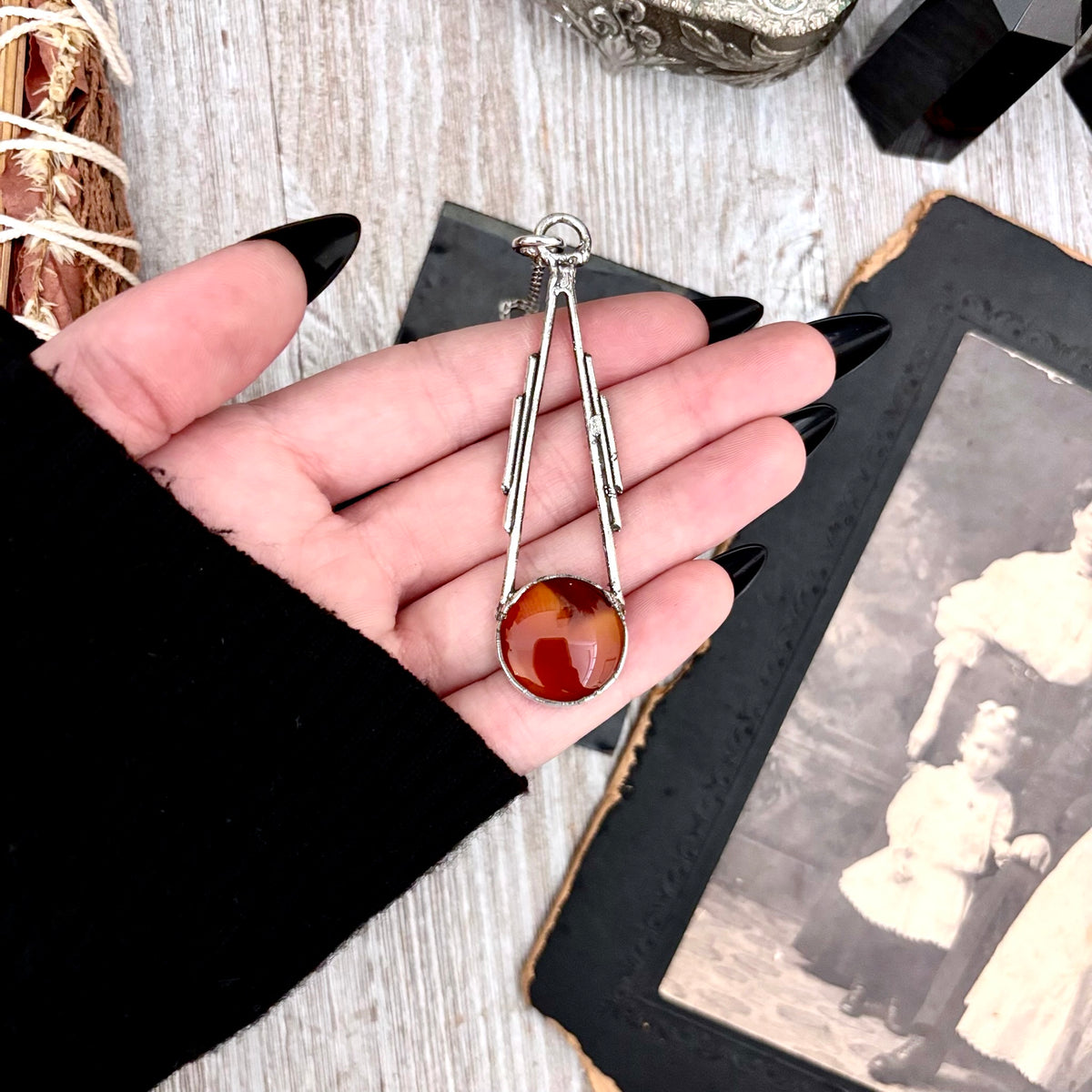 Red carnelian crystal necklace with fine silver setting from FOXLARK collection, featuring a one-of-a-kind design.