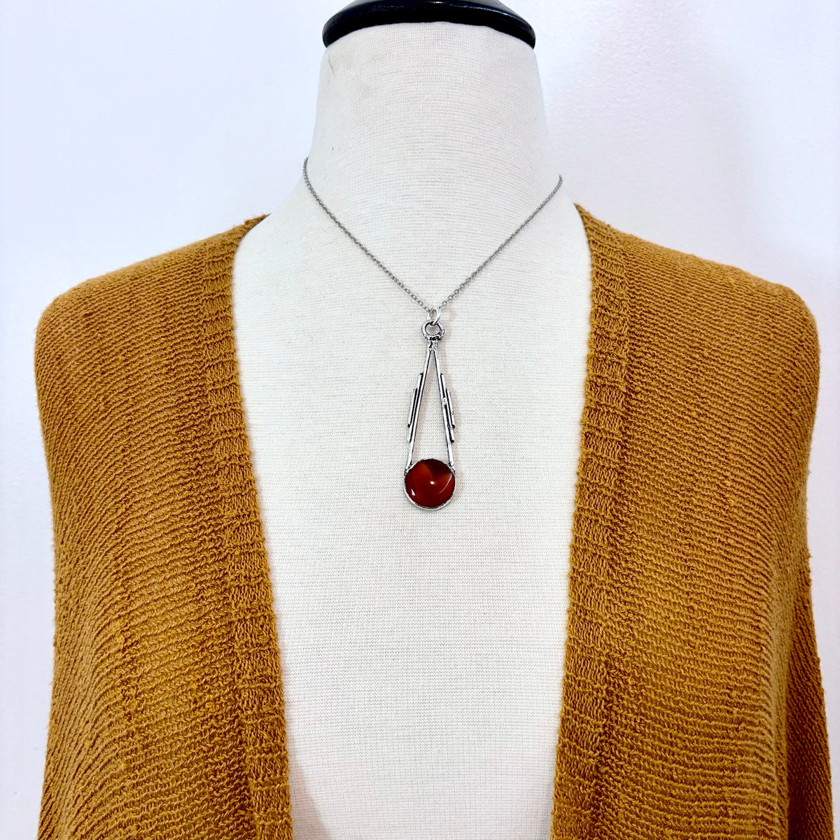 Red Carnelian crystal necklace by FOXLARK with fine silver setting, featuring a one-of-a-kind handcrafted design.