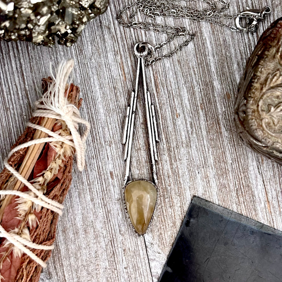 Citrine crystal pendant necklace with fine silver setting from FOXLARK Foxlark Collection, showcasing a unique one-of-a-kind design.