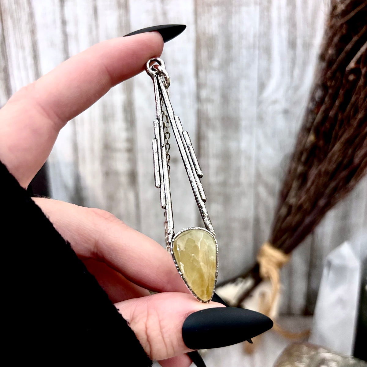 Citrine crystal pendant necklace in fine silver from FOXLARK NECKLACES, featuring a one-of-a-kind design with a polished citrine stone.