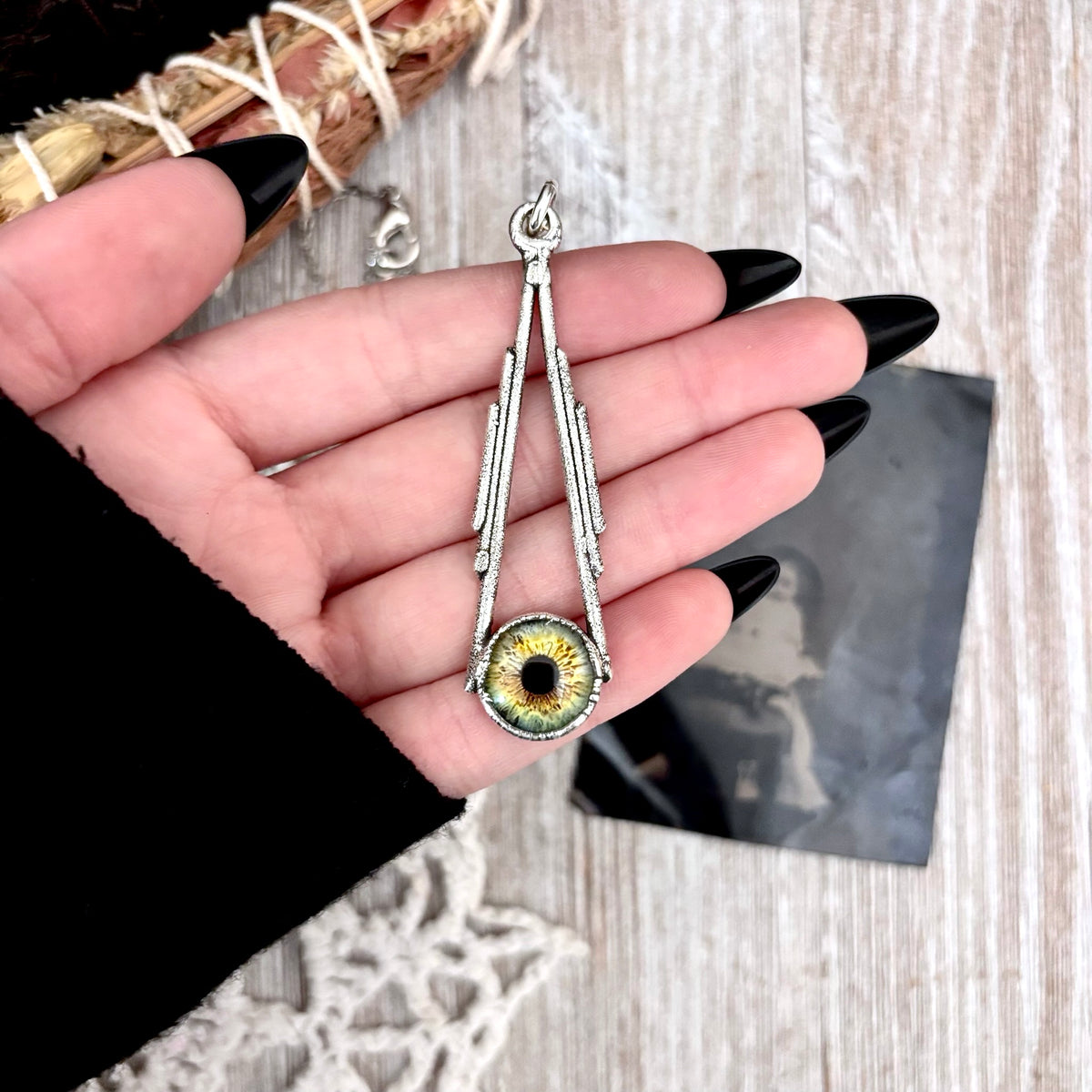 Green eyeball necklace made of fine silver by FOXLARK with a unique design from the Foxlark Collection.
