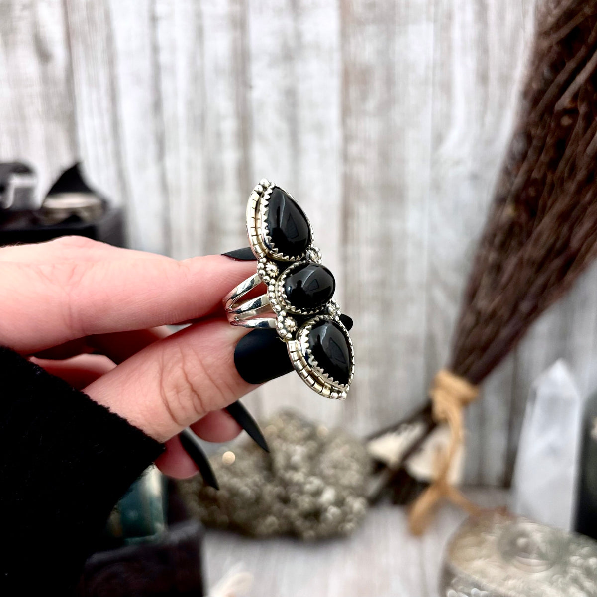 Sterling silver three-stone black onyx ring by FOXLARK with large crystal accent, available in sizes 6 to 11, witchy jewelry style