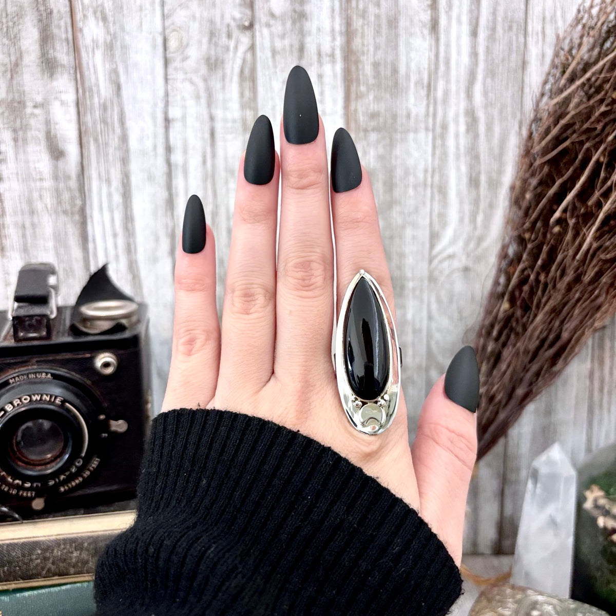 Black Onyx sterling silver ring by FOXLARK featuring a moon design, adjustable size 6-10, gothic crystal and witchy jewelry style.