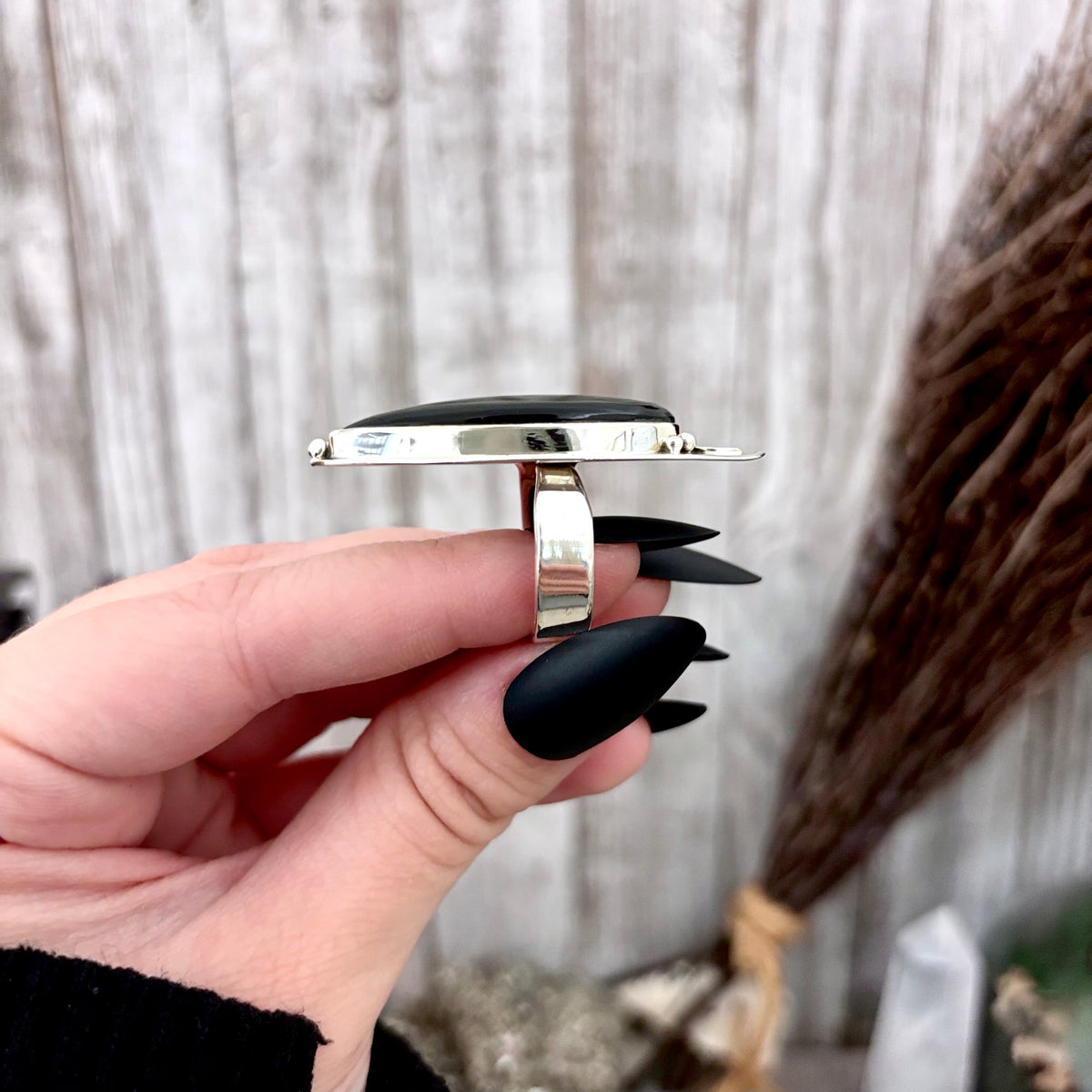 Black Onyx ring in sterling silver by FOXLARK, adjustable moon design with gothic crystal accents, perfect for witchy jewelry styles.