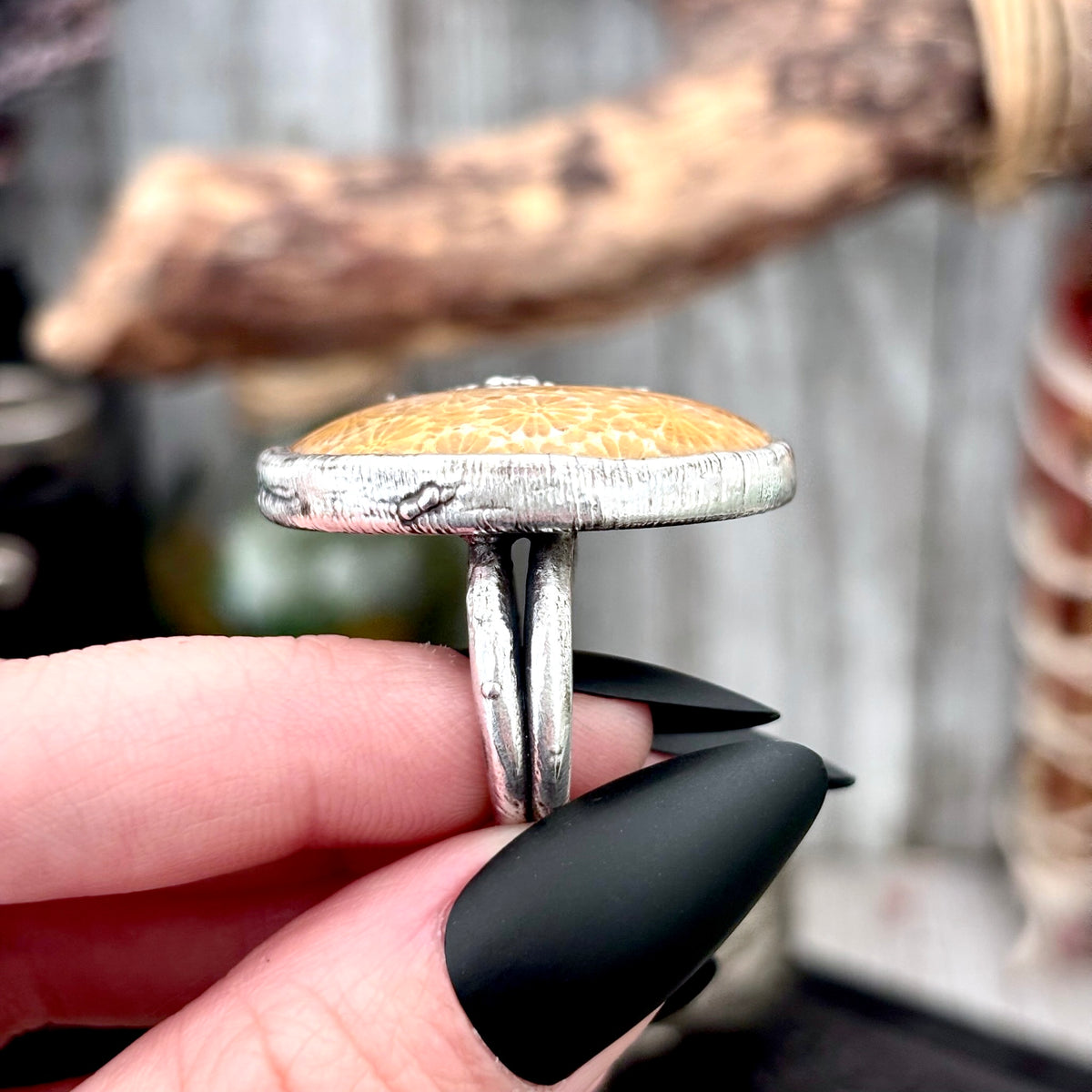 Fossilized coral crystal ring by Foxlark in fine silver, size 5.5, featuring unique fossilized coral details on a sleek band.