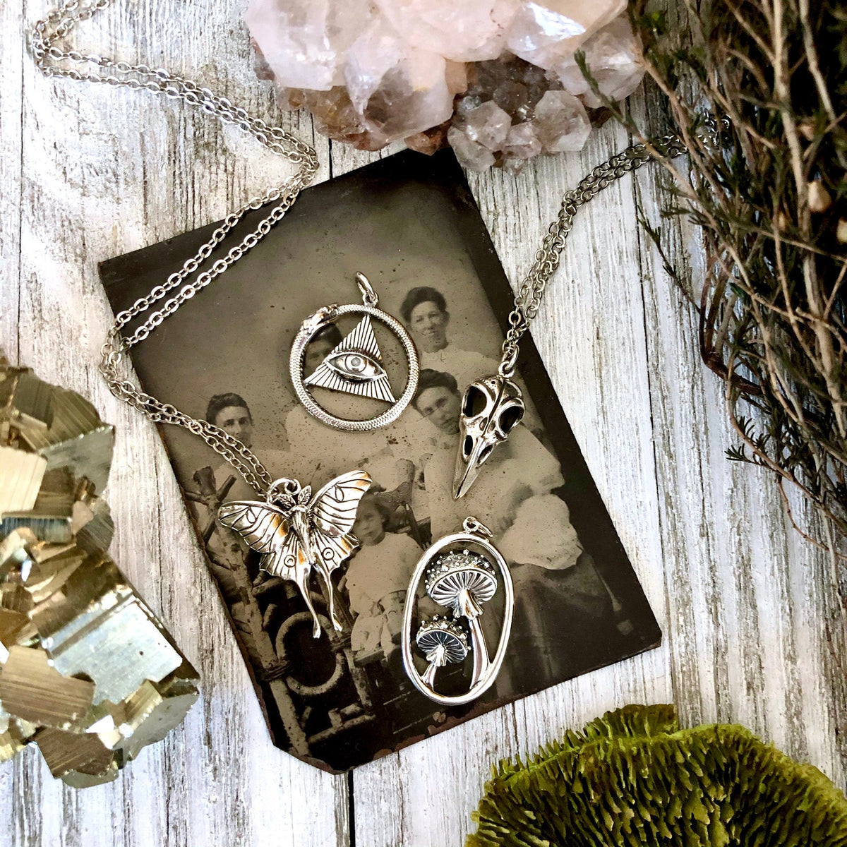 Sterling silver snake pendant with bronze moon and stars, part of FOXLARK Tiny Talisman Collection, 33x15mm.