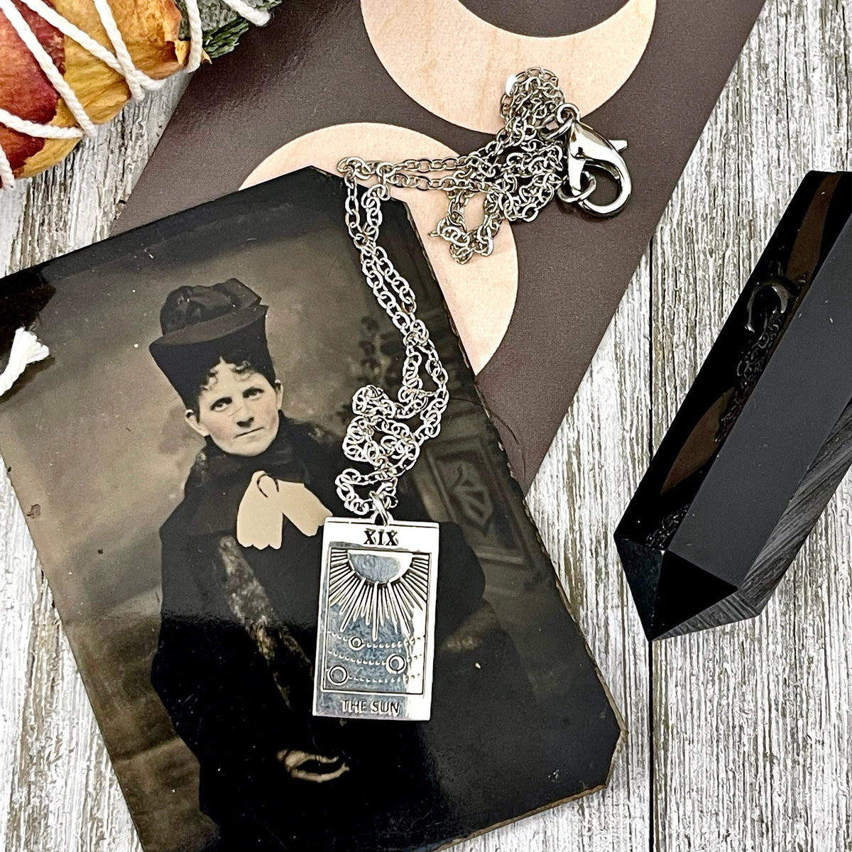 Sterling silver Sun Tarot Card necklace from FOXLARK Tiny Talisman Collection, featuring a 24x14mm sun tarot pendant.