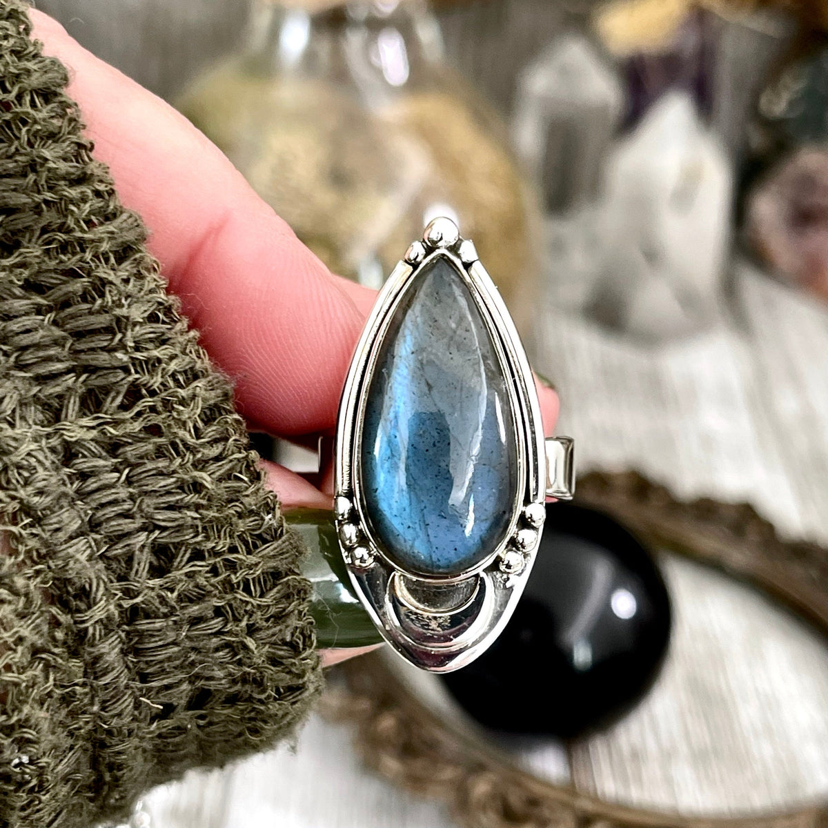 FoXLARK Midnight Moon Labradorite crystal ring in sterling silver, adjustable size 6-9, featuring a polished labradorite gemstone.