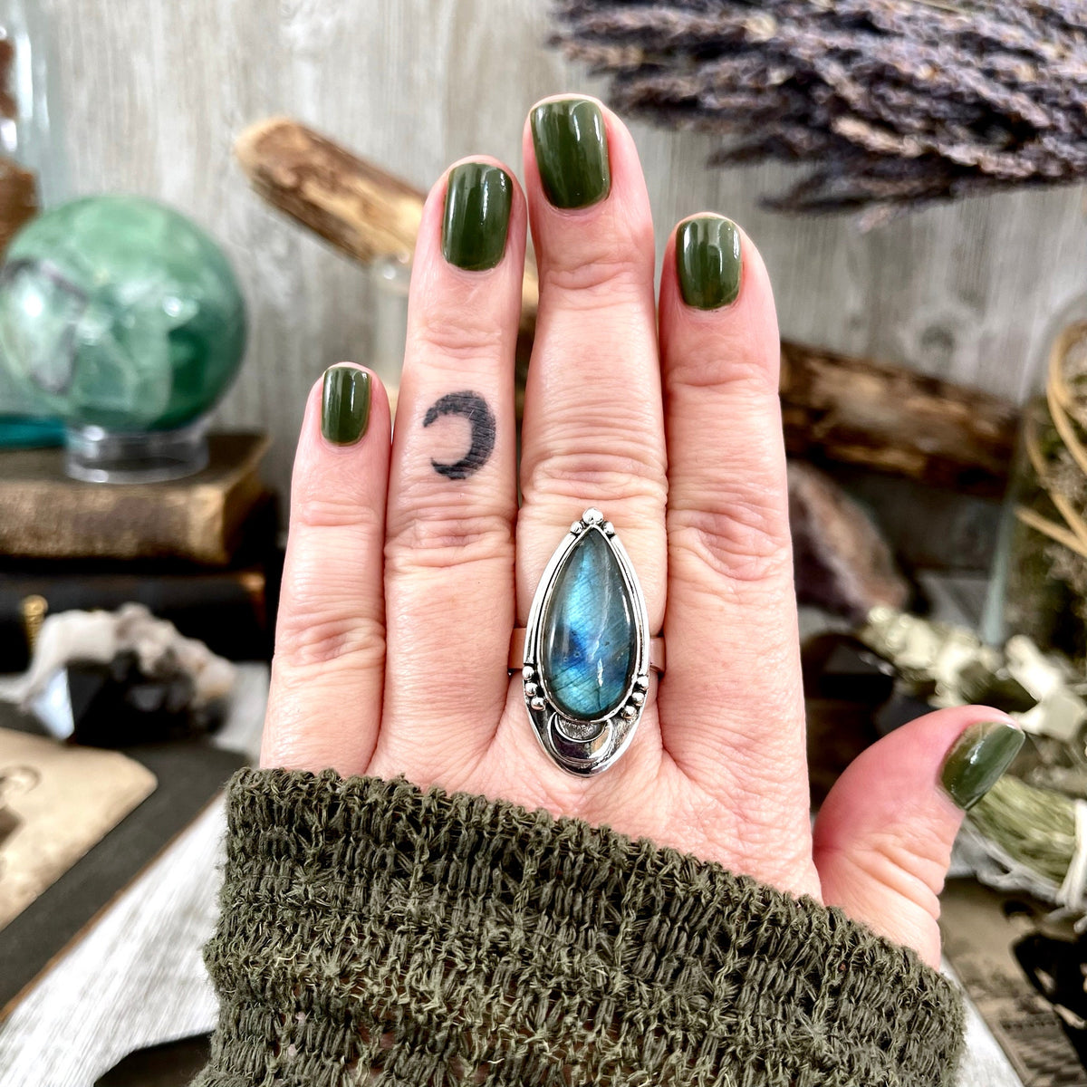 FoXLARK Midnight Moon Labradorite crystal ring in sterling silver, adjustable size 6-9, featuring a moon-inspired design.