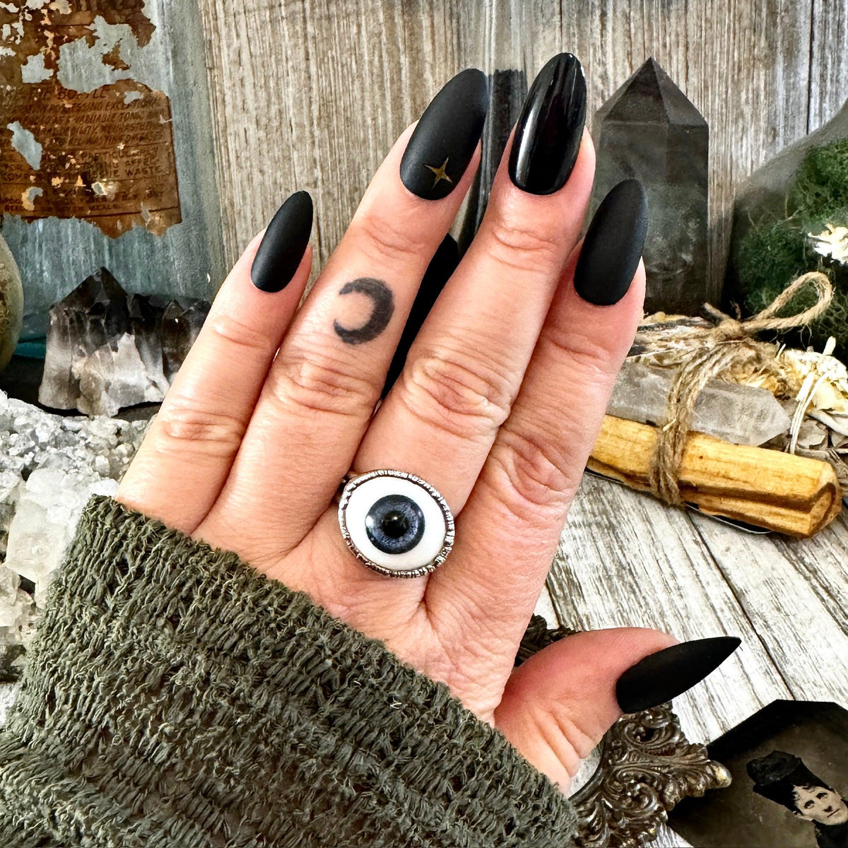 Silver blue iris glass eye ring by FOXLARK, available in sizes 6 to 10, featuring detailed iris design in a modern ring style