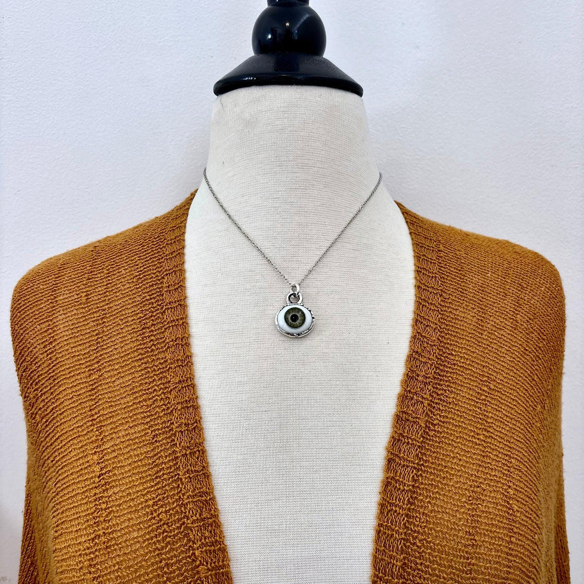 Green iris eye pendant necklace by Foxlark, fine silver jewelry with detailed iris design, one-of-a-kind piece from Foxlark Collection.