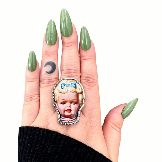 blue bow betty doll statement ring in fine silver
