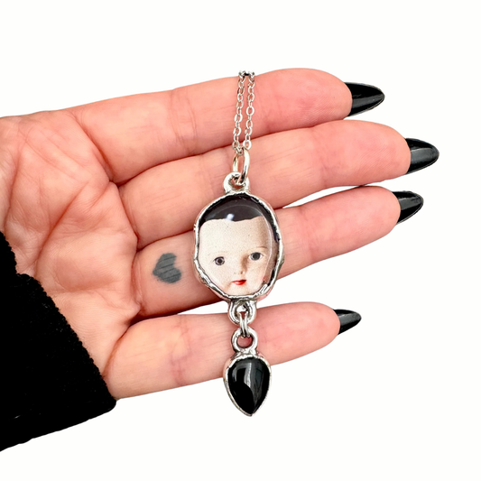 doll head necklace in fine silver with obsidian