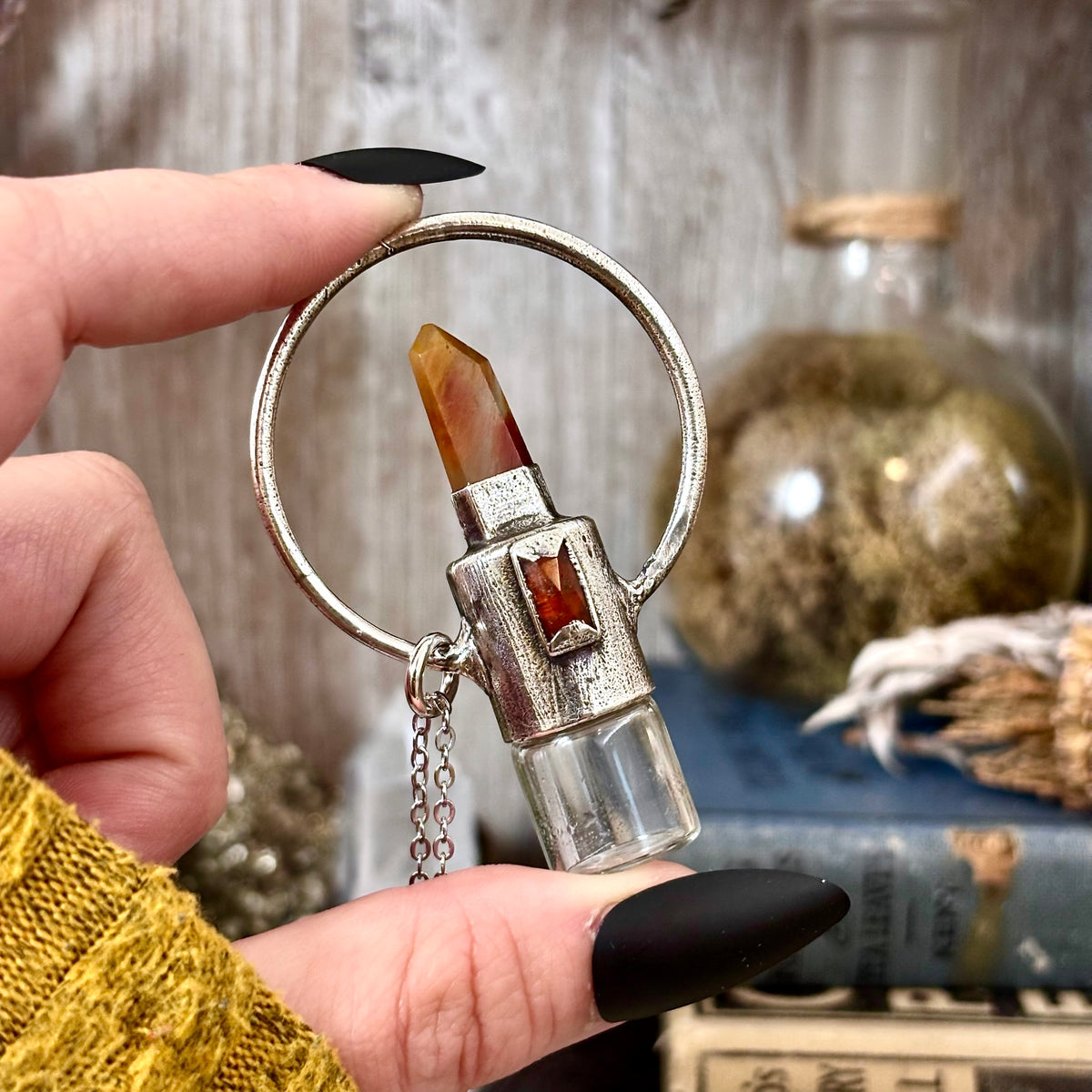 FOXLARK Garden Quartz and Orange Kyanite crystal necklace with silver rollerball pendant, showcasing vibrant gemstones and elegant design.