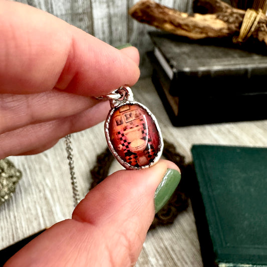 Silver vintage dive bar bathroom toilet necklace by FOXLARK, featuring detailed pendant with "Road To Nowhere" design.