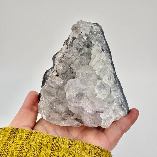 Self-standing amethyst geode crystal cluster from FOXLARK, showcasing vibrant purple crystals and natural textured rock base.