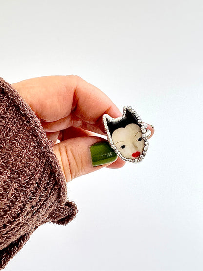 Silver Doll Head Ring from FOXLARK's Weirdlings Collection, size 7, featuring detailed doll head design in fine silver.